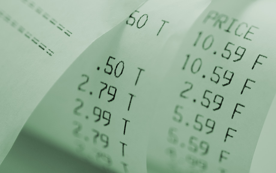 decorative photo: curled up shopping receipt with the word price at that top.